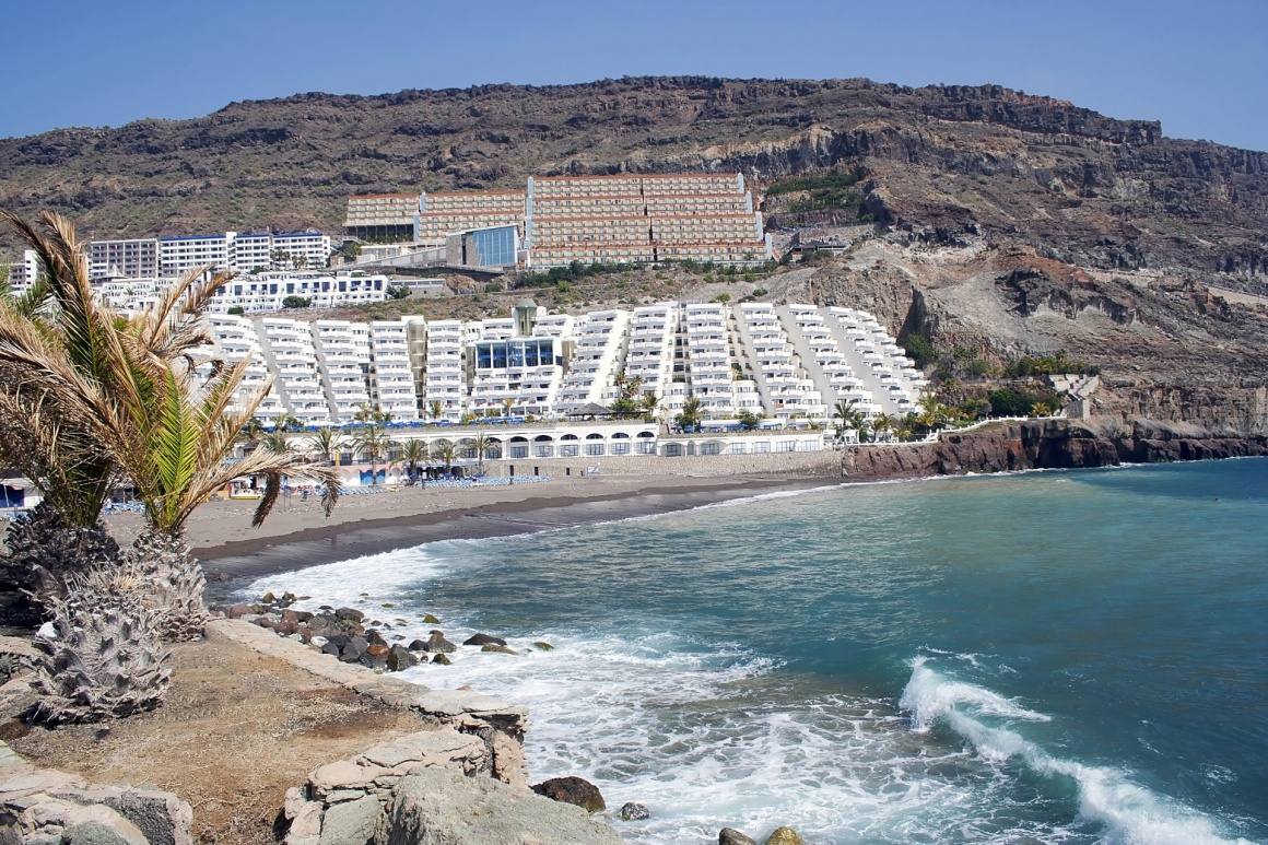 'The beach and sea front at playa taurito in Gran Canaria' - Gran Canaria Island